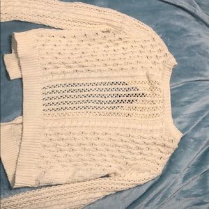 Knit sweater. Open back.